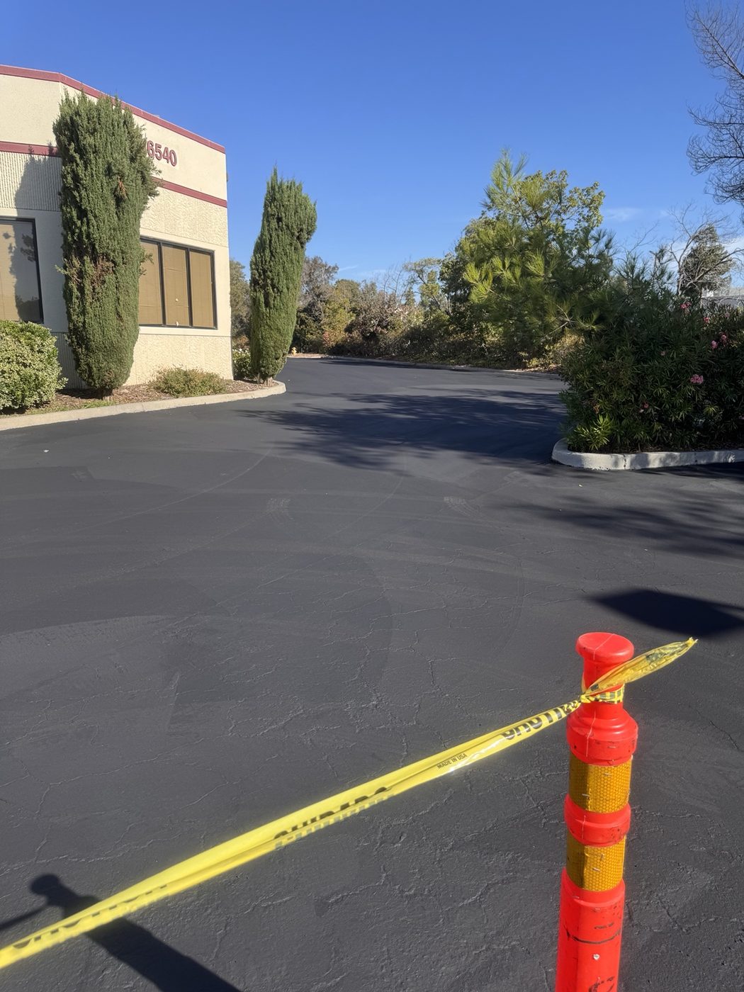 Commercial parking lot after asphalt maintenance