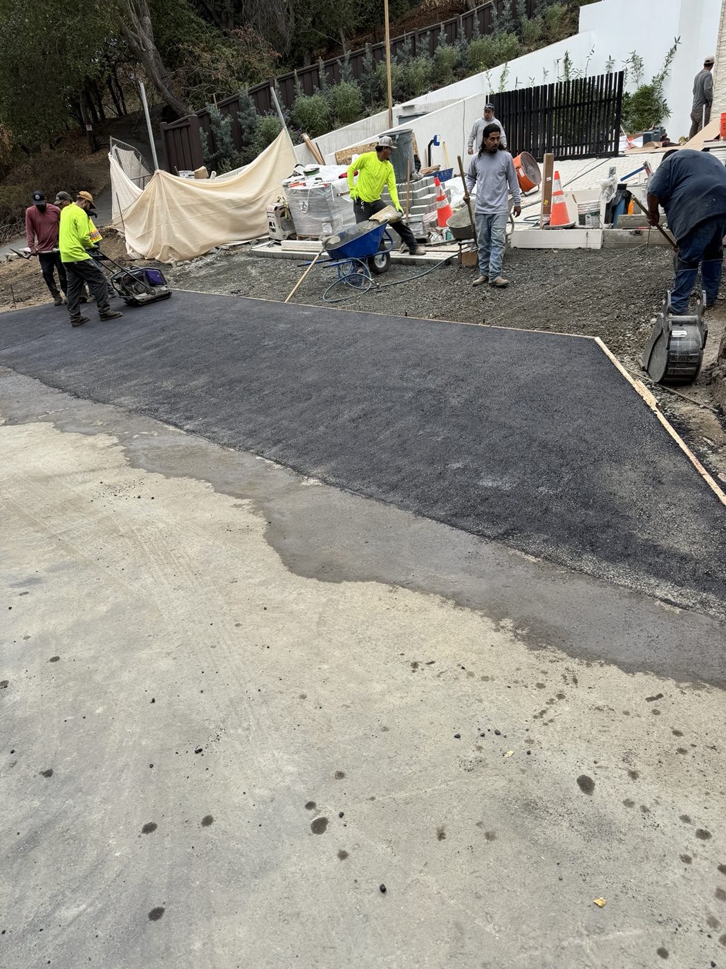 Crew working on asphalt and site improvements