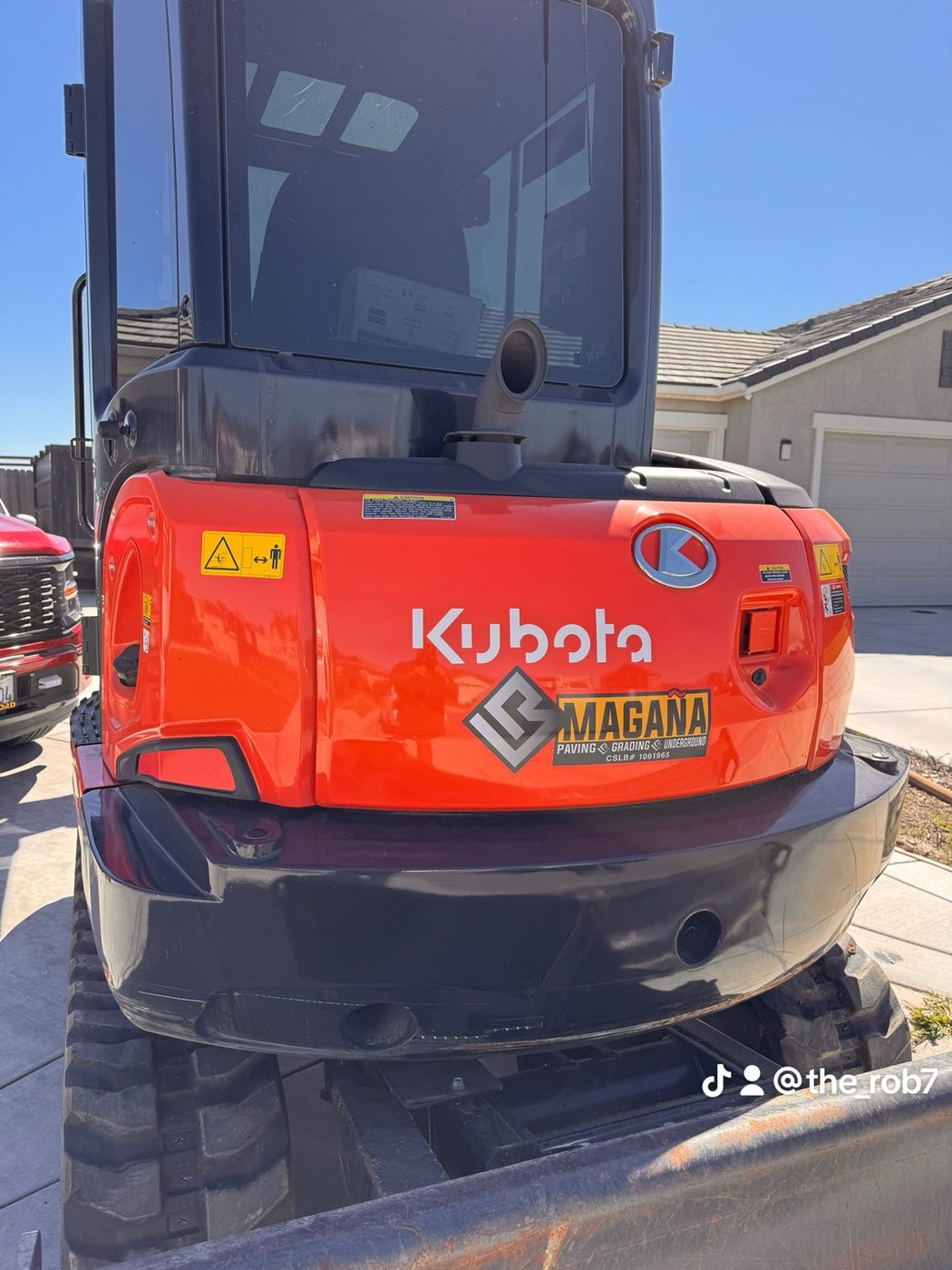 Kubota excavator with Magaña branding
