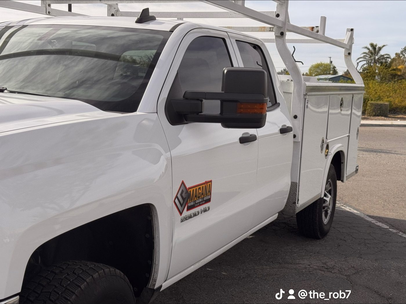 Magaña branded white service truck